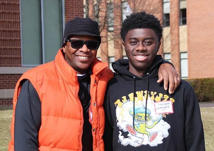 dad and son at open house